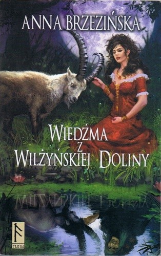 Wiedźma z Wilżyńskiej Doliny - na okładce czarnowłosa kobieta w czerwonej sukience klęcząca przy koźle